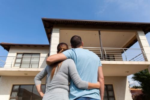 couple outside home